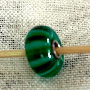 Trollbeads. Green stripe.
